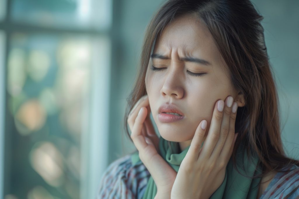 closeup-young-lady-holding-hand-neck-suffering-from-strep-throat-wisdom-tooth-pain